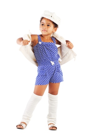 Beautiful stylish little girl against white backgroundの写真素材