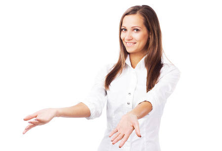 Lovely woman holding something imaginary. Isolated on white backgroundの写真素材