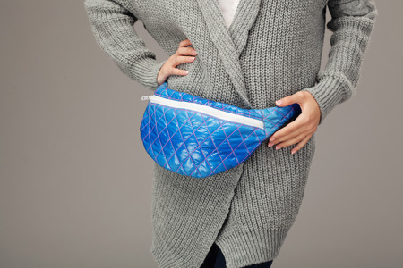 Elegant woman with a fanny pack. Closeup pictureの写真素材