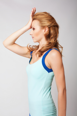 Beautiful sporty woman doing exerciseの写真素材