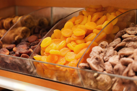 Dried fruits. Focus on apricots. Closeup pictureの写真素材