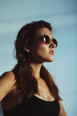 Summer girl. Portrait of a beautiful woman in sunglassesの写真素材