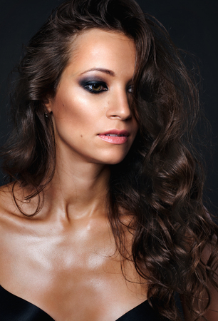 Closeup portrait of beautiful sexy woman with healthy skin and gorgeous hairの写真素材