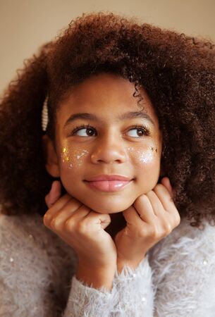 Portrait of cute beautiful girl with shiny makeupの写真素材