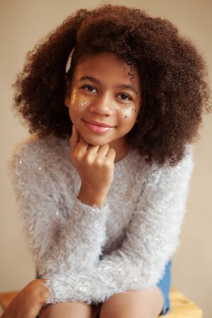 Portrait of cute beautiful girl with shiny makeupの写真素材