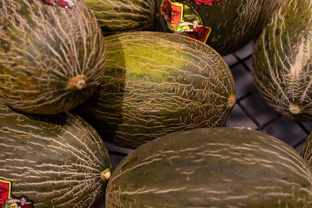 Melons on the counter in the supermarket, close-up, selective focus.の写真素材