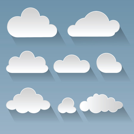 Set of white paper clouds with flat shadows on a blue backgroundのイラスト素材