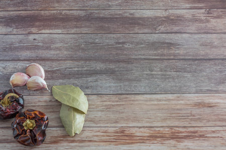 herbs and spices on wooden backgroundの写真素材