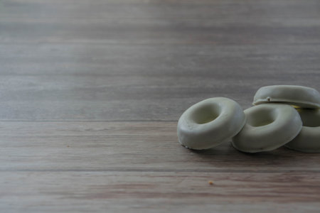 Candle on the wooden floor in the dark tone, stock photo