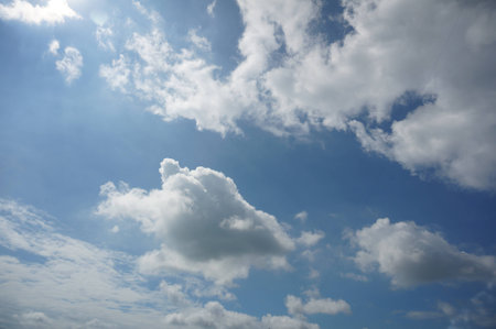 Sunny sky with cloudsの写真素材