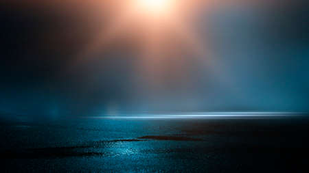 Dark street wet asphalt reflections of rays in the water Abstract dark blue background smoke smog Empty dark scene neon light spotlightsの写真素材