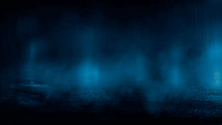 Dark street wet asphalt reflections of rays in the water Abstract dark blue background smoke smog Empty dark scene neon light spotlightsの写真素材