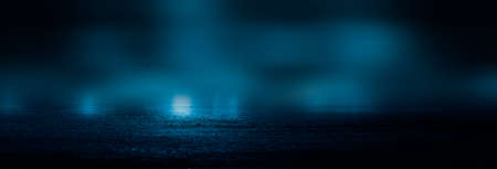 Dark street wet asphalt reflections of rays in the water Abstract dark blue background smoke smog Empty dark scene neon light spotlightsの写真素材