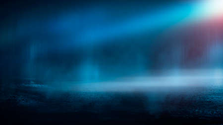 Dark street wet asphalt reflections of rays in the water Abstract dark blue background smoke smog Empty dark scene neon light spotlightsの写真素材