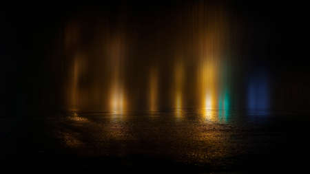 Dark street wet asphalt reflections of rays in the water Abstract dark blue background smoke smog Empty dark scene neon light spotlightsの写真素材
