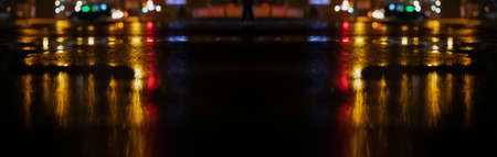 Dark street wet asphalt reflections of rays in the water Abstract dark blue background smoke smog...