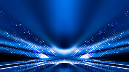 Abstract dark futuristic blue night background. Rays and lines, lightning, lights. Blue neon light, symmetrical reflection, futuristic light tunnel, stage.の写真素材