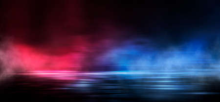 Wet asphalt, reflection of neon lights, a searchlight, smoke. Abstract light in a dark empty street with smoke, smog. Dark background scene of empty street, night view, night city.の写真素材