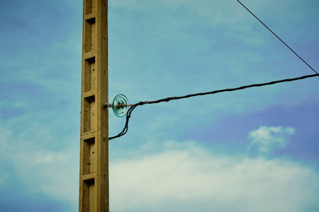 telegraph pole detail in a rural area.