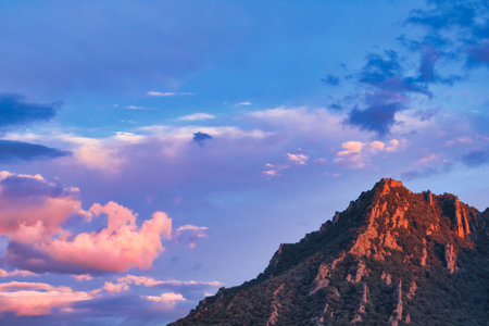 Colorful Sunset Over Rocky Mountain Peakの写真素材