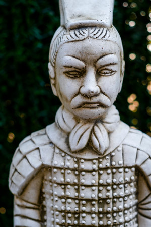 Terracotta army soldier statue exhibiting traditional chinese armorの写真素材