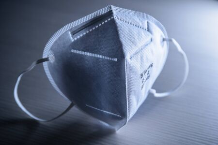 Surgical mask KN96 marked with logo used for self protection from Coronavirus COVID-19の写真素材