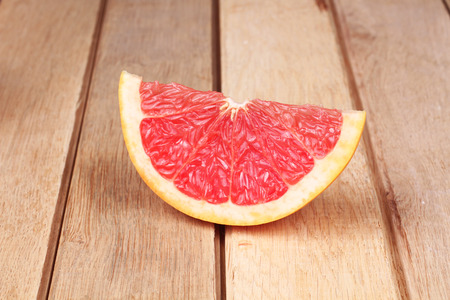 Grapefruit on a wooden boardの写真素材