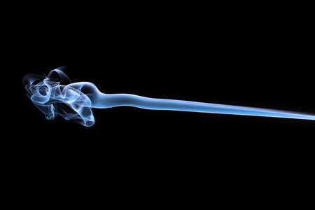 Blue smoke from the burned matchstickの写真素材