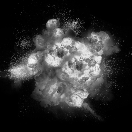 Fireball explosion with sparks over black backgroundの写真素材