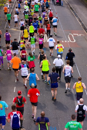 LONDON - APRIL 22  Unidentified people run the London marathon on April 22, 2012 in London, England, UK  The marathon is an annual event のeditorial素材