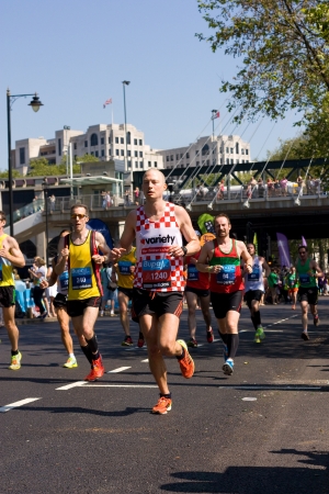 LONDON - MAY 27: Unidentified people run the London bupa 10K on May 27th 2012 in London, England, UK. The Bupa 10k is an annual eventのeditorial素材