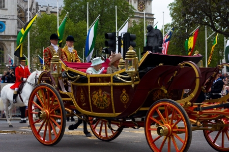 LONDON - JUNE 5: The Queen's carriage procession  makes its way to Buckingham Palace during the Diamond Jubilee celebrations on June 5, 2012 in London, England, UK. The diamond Jubillee marks 60 years of the Queen's reign.のeditorial素材