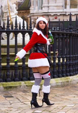 LONDON-DEC 15: Unidentified santa's in the street at the Santacon street festival in London, England, Uk. Santacon is an annual event.のeditorial素材