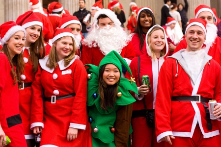 LONDON-DEC 15: Unidentified santa's in the street at the Santacon street festival in London, England, Uk. Santacon is an annual event.のeditorial素材