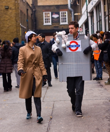 LONDON - FEBRUARY 12TH: Unidentified competitors at the Great spitalfield pancake race on the 12th of February 2013 in london, UK.  The Great Spitalfield pancake race raised money for the London's Air Ambulance.のeditorial素材