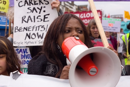 LONDON - APRIL 13TH: Unidentified people protest at the Thousand Mothers March for Benefit Justice...