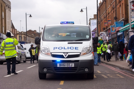 LONDON - APRIL 13TH: Unidentified people protest at the Thousand Mothers March for Benefit Justice in Tottenham, London on April the 13th 2013.  The "bedroom tax" effects the working class people.のeditorial素材