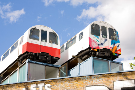 LONDON, ENGLAND, UK - MAY 8th, 2014: Ornamental train wagons in shoreditch on May the 8th 2014 London, uk. The shoreditch trains are a well known touristic landmark.のeditorial素材