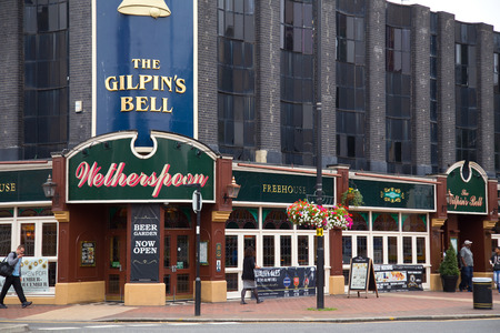 LONDON - SEPTEMBER 5TH: The exterior of the Gilpin's Bell Pub on September the 5th, 2014, in London, England, UK. Wetherspoon's is the uk's biggest pub chain.のeditorial素材