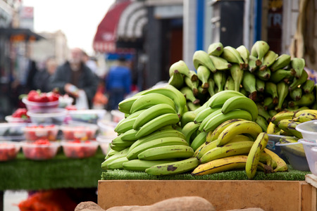street market stall selling plantains.の写真素材
