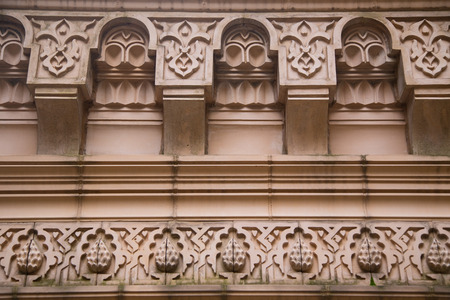 some detail on a building in a church yard near bank station.の写真素材