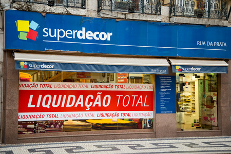 LISBON - JANUARY 13TH: Closing down sale sign at superdecor on January the 13th, 2015, in Lisbon, Portugal. Many Portuguese business's are struggling due to the recent depression.のeditorial素材