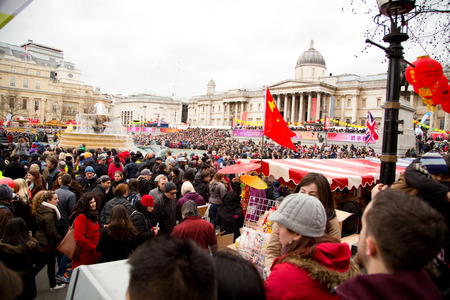 LONDON - FEBRUARY 22nd: unidentified spectators at the Chinese new year celebrations on February the 22nd, 2015, in London, England, UK. Chinese new year is an annual eventのeditorial素材