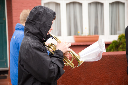 LONDON - MARCH 29TH: Unidentified musician at a palm sunday procession on March the 29th, 2015, in...