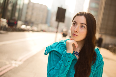portrait of a young woman looking thoughtfulの写真素材