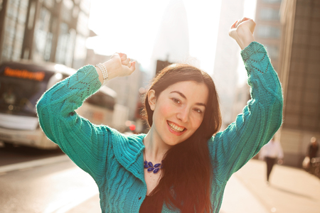 happy girl in the streetの写真素材