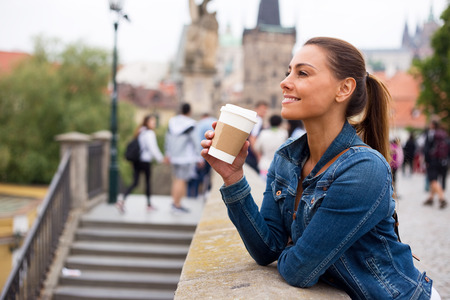 young woman in prague enjoying her dayの写真素材