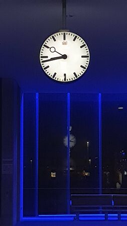 Station hall with station clockの写真素材