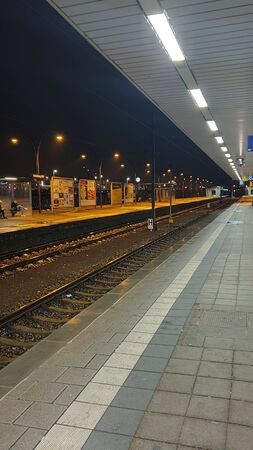 Train tracks in a train stationの写真素材