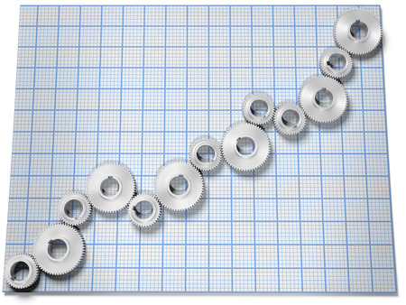 Business company growth chart as row of gears on graph paperの写真素材